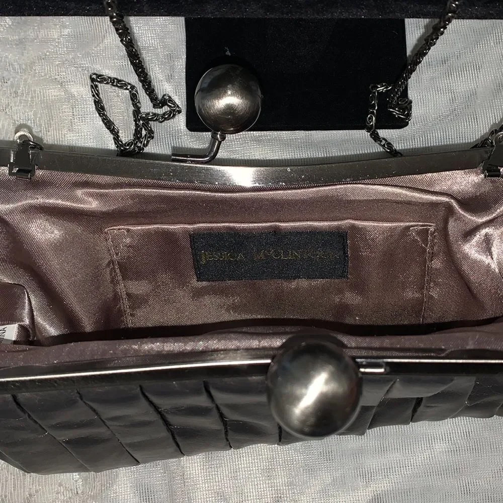 Jessica McClintock faux Leather kiss lock clutch in bronze